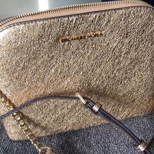 Brand new with tags Michael Kors gold crossbody.